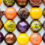 Overhead view of a variety of colorful molded chocolates