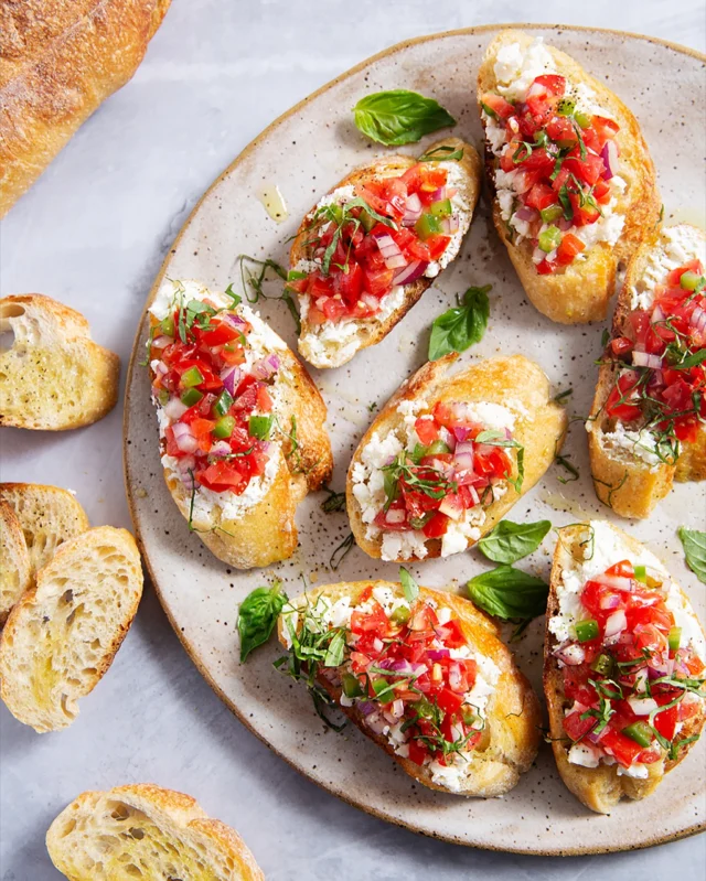 On these hot summer days, may we suggest that you grab a loaf of bread, some beautiful ripe veggies from your garden (ok, or from the grocery store if you’re not an urban farmer) and let your imagination run wild!

Here we’ve created fresh tomato bruschetta with feta cheese, fresh basil and  drizzled with olive oil.

#BreadForDinner #FreshBread #ArtisanBread #SeattleSummer