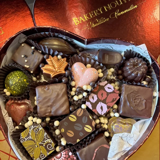 Our specially curated heart-shaped boxes of chocolates are now available in all 3 shops. We also just launched our chocolate-pedia webpage, where you can view and learn about all of our confections. (Link in the bio) There is a beautiful identifying photo and flavor profile description for each chocolate. It’s kinda fun.