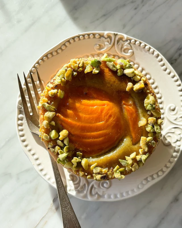 Say hello to an old friend...
The Apricot Pistachio Tart. 

If you’re already a fan, then you need not read further. But if you’re not sure, take a listen...

Imagine a rich, velvety almond cream, but instead of just almond cream, it’s swept together with buttery, vibrant green pistachio cream. It’s smooth, slightly nutty, a little sweet, with a deep, earthy flavor. Topped with jammy, tender apricots, their bright tart-sweet burst delivers a crisp contrast to the delicate pistachio frangipane. 

Now try it. 

#apricotpistachiotart
