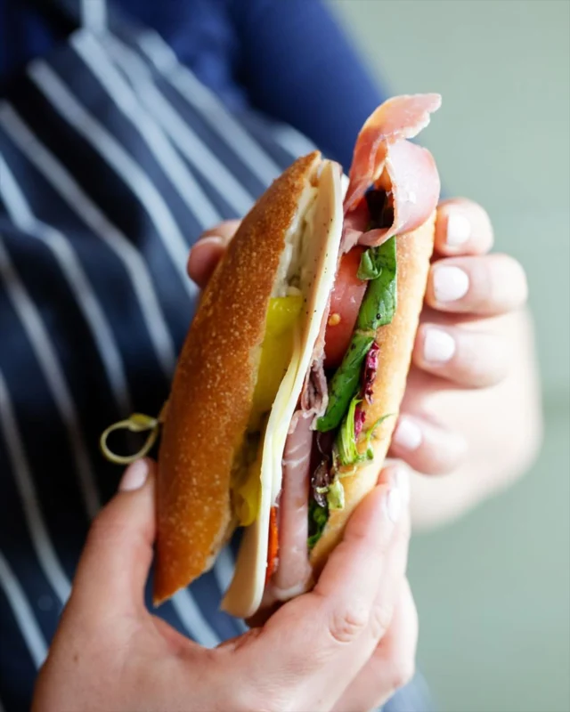Layered with Chef’s handpicked cured meats, provolone, juicy tomatoes, zippy pepperoncini, fresh greens, vinaigrette, and a swipe of mayo—all tucked into one of our house-made Italian rolls.

Perfect for a picnic, a quick lunch...honestly it’s just perfect.

#BurienBites #ItalianRoll #LunchGoals #Buriensandwich