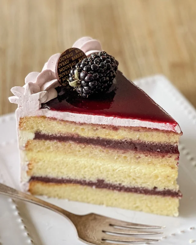 With the magic of our PNW summer, this year’s blackberries are nothing less than spectacular. To honor their fleeting perfection, Chef has crafted something truly special…

The Blackberry Summer Cake

Just like our beloved Spring Cake, this beauty features layers of vanilla butter cake, silky blackberry crémeux, and a blackberry buttercream finish that is topped with a glossing of our house-made blackberry jam.

Every bite tastes like summer. 

#BlackberrySummerCake #BerryDelicious #BlackberrySeason #SummerFlavors #CakeCrush