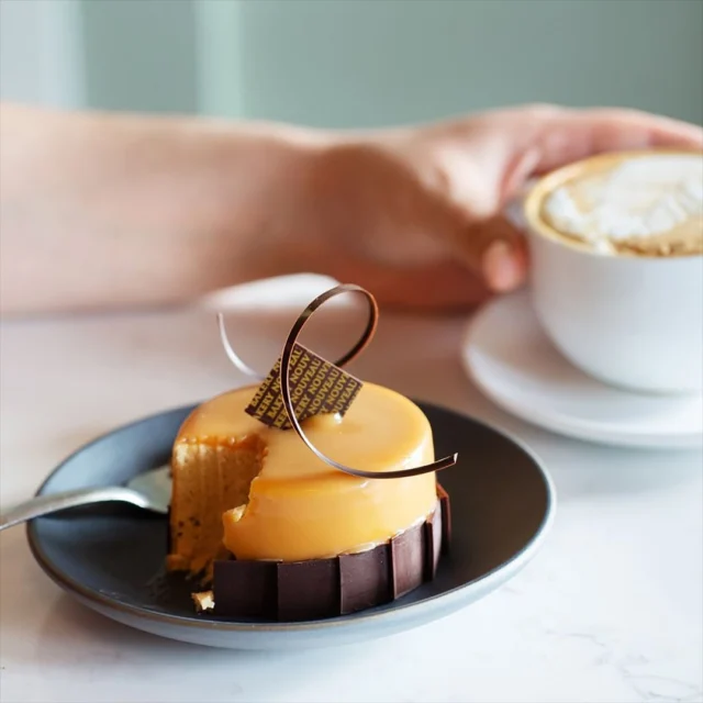 It’s been a minute since the Phoenix Cake graced our cases, but she’s back in all her sweet, velvety glory. Layers of caramel, pear and chocolate mousse, along with a layer of caramelized pecans, enrobed in a caramel glaze, all resting on a buttery pecan dacquoise.

If you’ve ever wondered what a dessert hug feels like, now you know.

#PhoenixCakeIsBack #PhoenixCake #DessertsofInstagram #BakeryNouveau