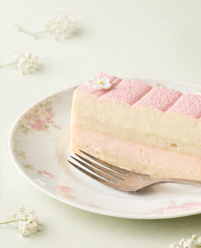 Each spring, it feels like all of Seattle pauses for the cherry blossoms. For a few fleeting days the city softens, petals drifting through the air, light turning pale and rosy, everything feeling briefly suspended between winter and summer.

Our Sakura Cake was created for exactly this moment.

Layers of airy lemon chiffon are gently soaked with limoncello syrup, then nestled between vanilla bavarois and delicate cherry blossom bavarois. The whole cake is finished with a whisper of pink cocoa butter, echoing the soft bloom of the trees themselves.

#SakuraCake #SakuraBakeryNouveau #Sakura