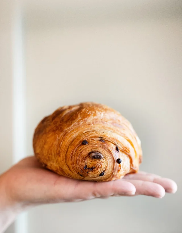 Welcome to the weekend, you sexy, butter-laminated, flaky pastry!

Shattering golden crisp on the outside, tender melt-in-your-mouth layers on the inside, and nuggets of house-made chocolate tucked into every buttery fold.

TGIF!!