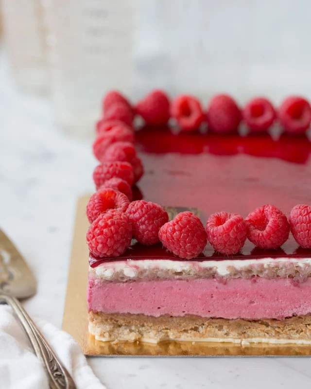 Another beautiful friend has returned for the summer!

Our Ballet Cake is back, bringing together a refined study in contrasts, with a vibrant, tart raspberry glaze and airy mousse layered over a white chocolate almond crunch and moist sponge cake. Sophisticated, texturally surprising and perfectly sweet, but not too sweet.